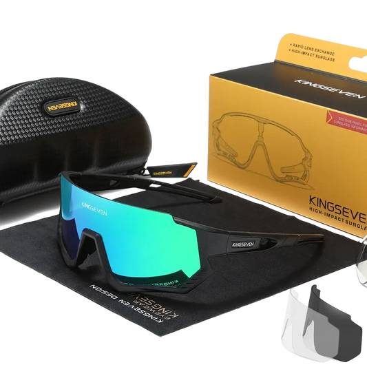 cycling sunglasses with blue/green lenses and black frames. Includes interchangeable lenses